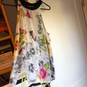Floral flowy sleeveless top.